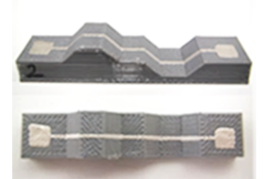 Grafik: Dispensergedruckte Leiterbahnen auf additiv gefertigtem Bauteil